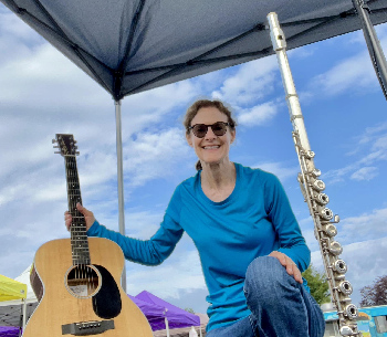 Laurie with guitar & flute