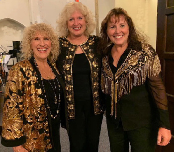 Photograph of The Jazzettes
  in black and gold